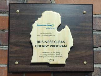 Consumers Energy Plaque reading, "Business Clean Energy Program 2023."
