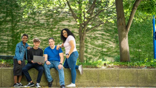 Promise zone students studying outside