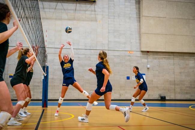 GRCC volleyball players practicing earlier this year.