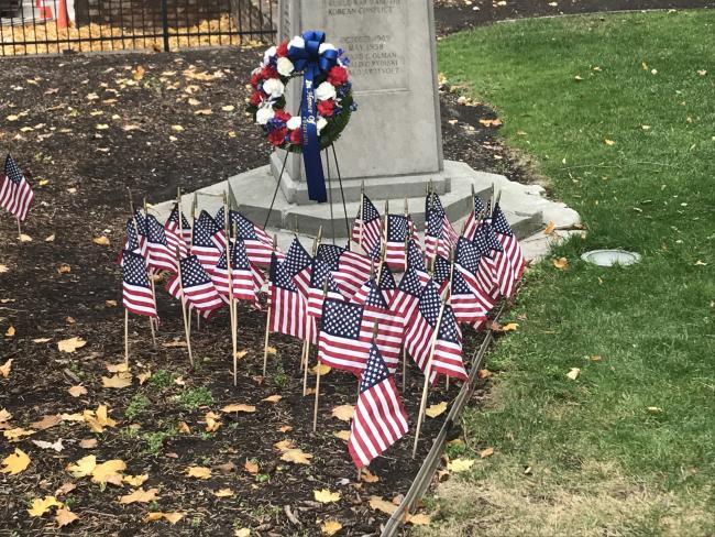 Veterans grave site with american flags
