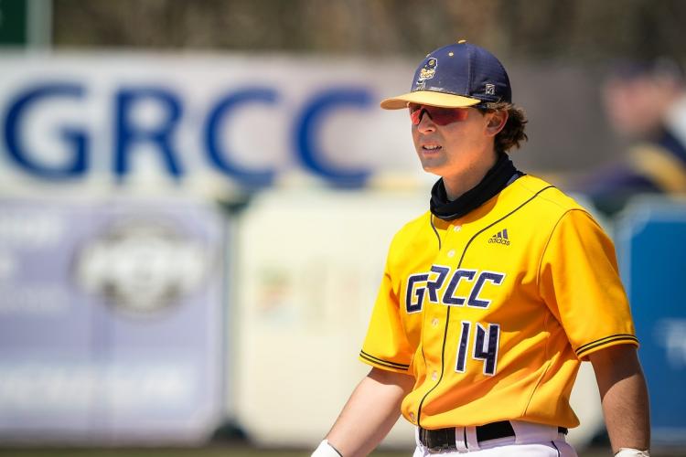 Aaron West playing against in the field against Kellogg Community College