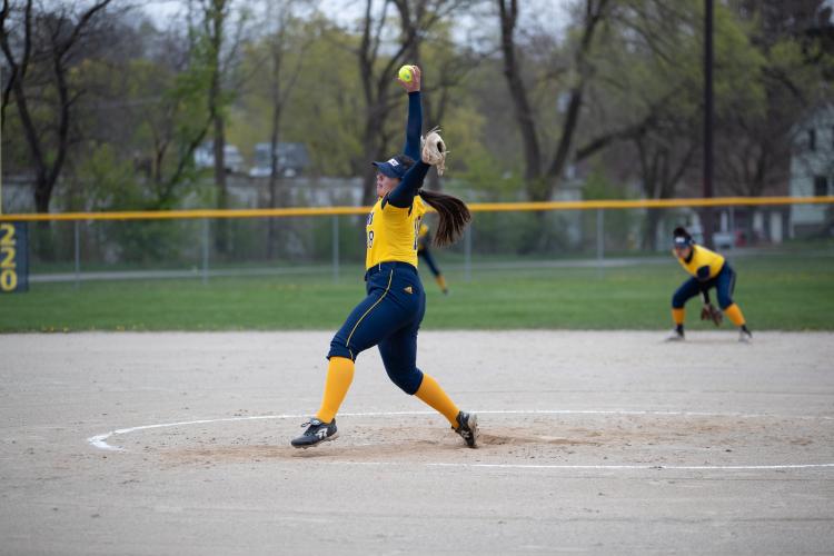 Alexa Abrahamson winding up on the mound.