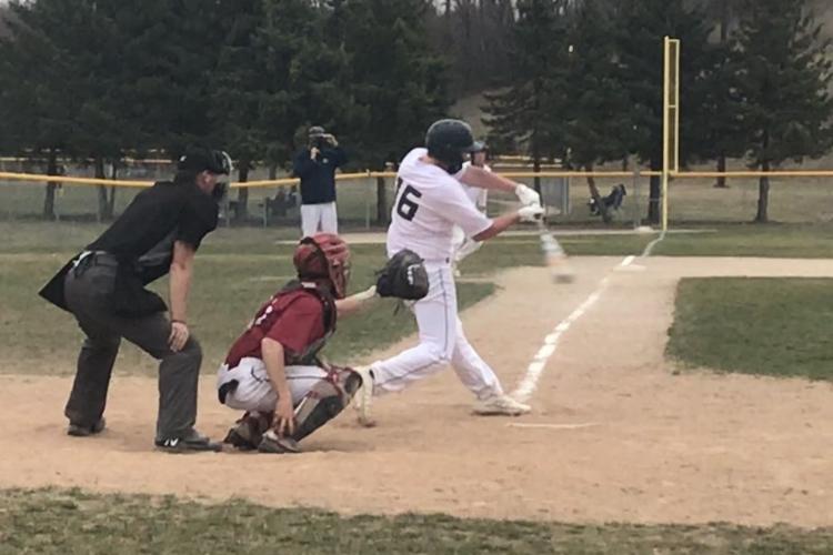 A GRCC batter in action on Saturday.