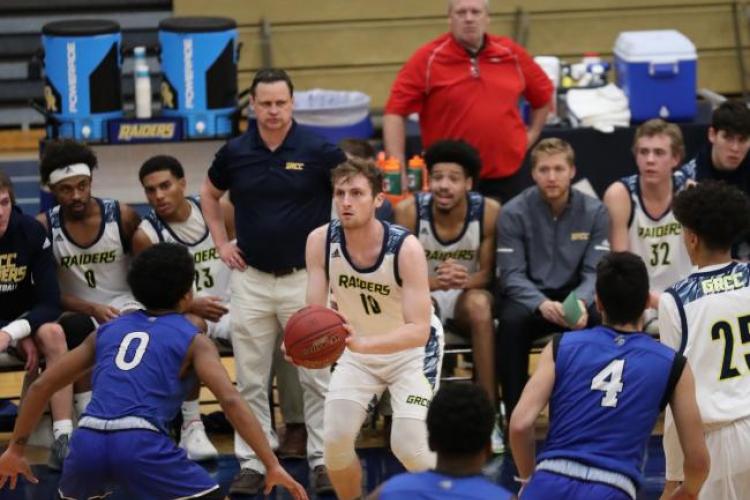 GRCC basketball coach Jeff Bauer watches the action on the court.