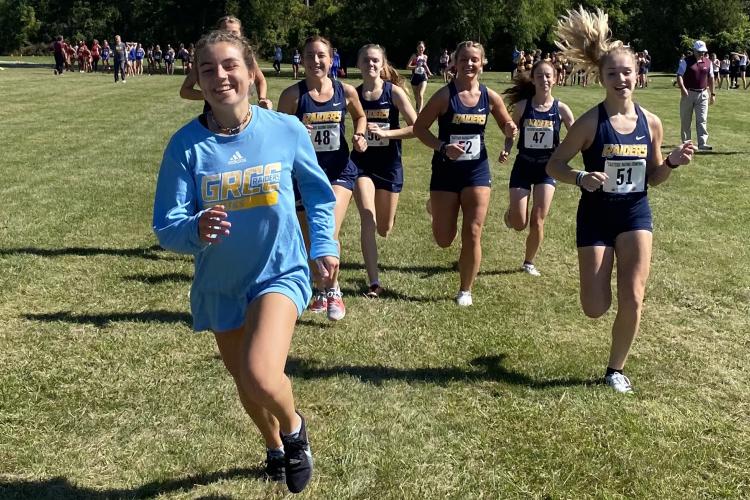 Members of the GRCC women's cross country teams in a race.