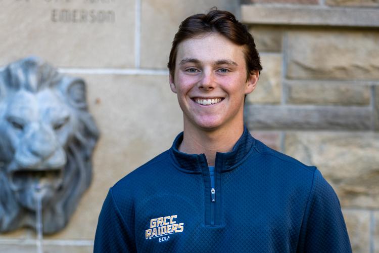 Portrait of Drew Harrington near the iconic lion fountain.