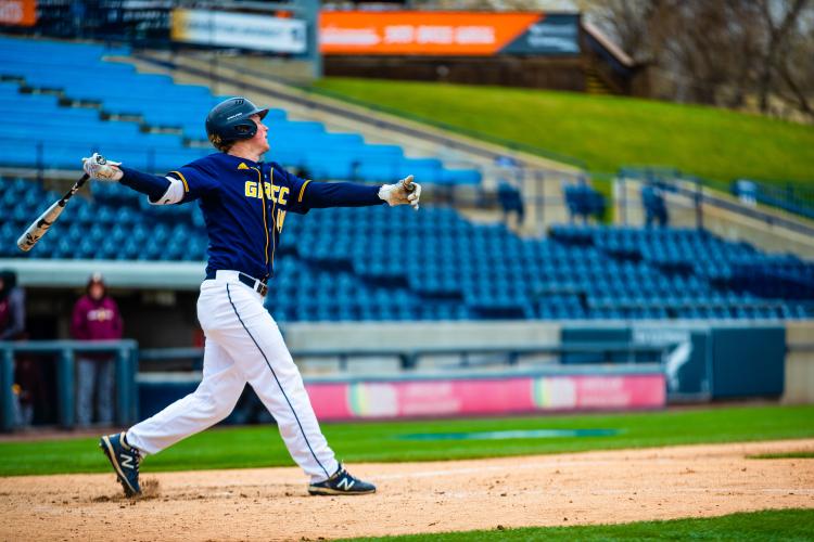 Ryan Dykstra swinging at the plate.