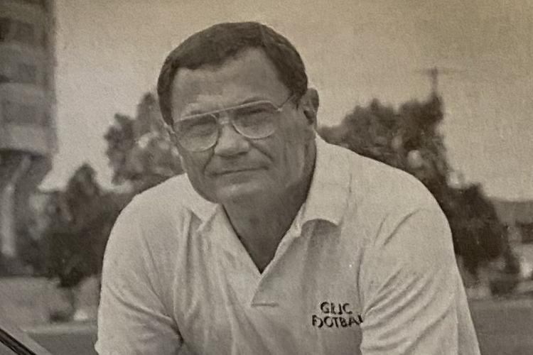 Portrait of Fred Julian on the football field.