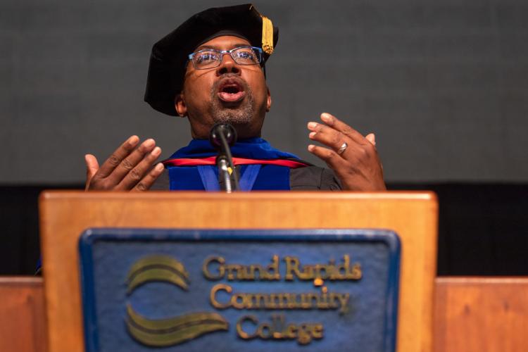 GRCC President Pink speaking at the podium during commencement in 2020.