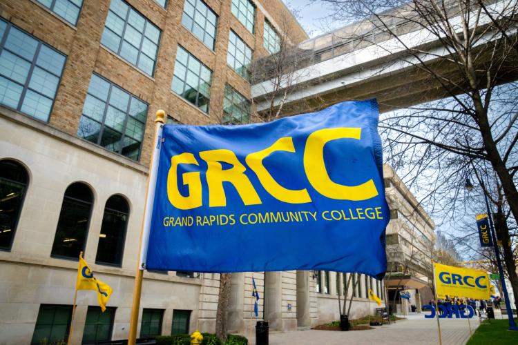 A GRCC flag blowing on the Olivarez Plaza. 