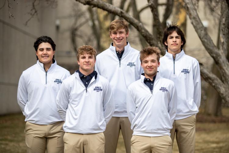 The GRCC gold team posting for a team photo.