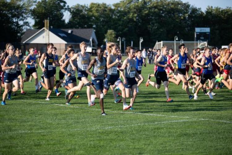 Cross country runners as the race begins.