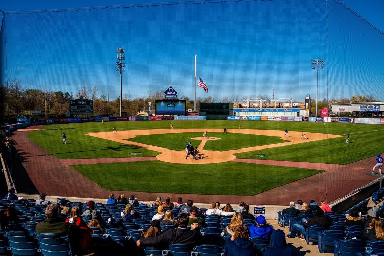 GRCC players on the field at LMCU Ballpark.