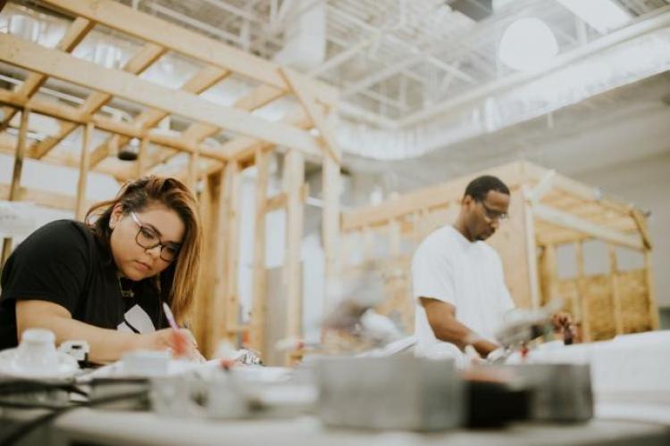 Students working in a construction class