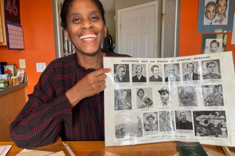 GRCC professor Mursalata Muhammad pointing to a photo of her grandfather.