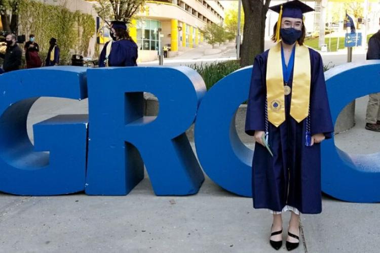 Voca Ford prior to GRCC's commencement by the large letters.