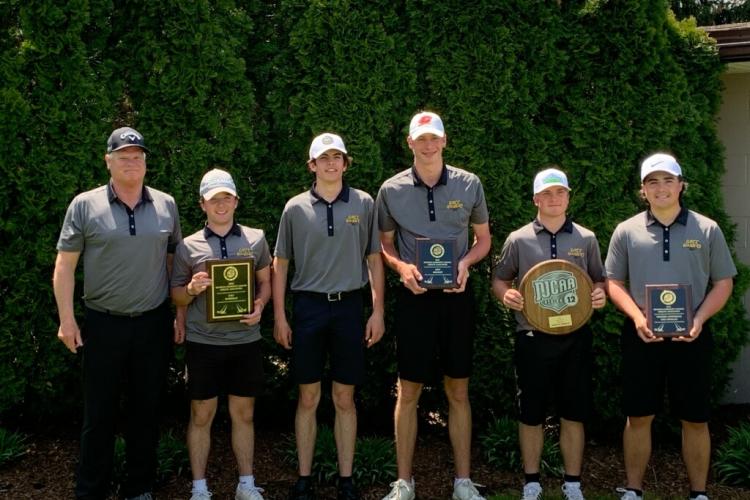 The GRCC golf team holding trophies after competition on Tuesday.