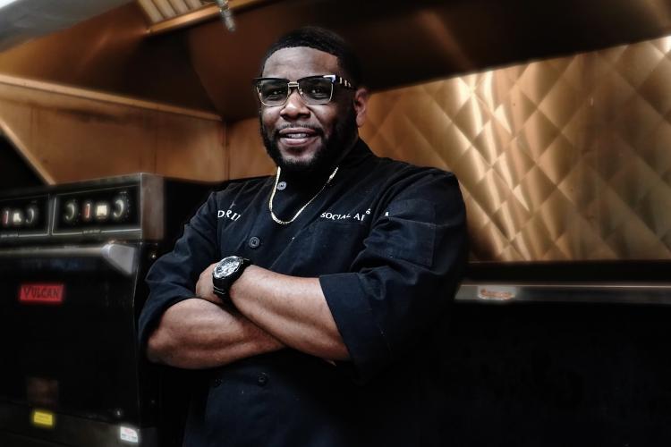 Portrait of Darrin Mayweather in his kitchen.