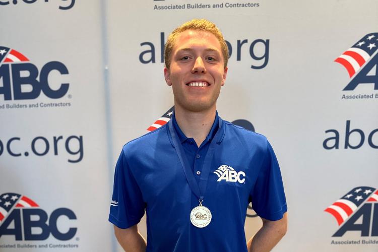 Wade Wiltenburg posing with his medal.