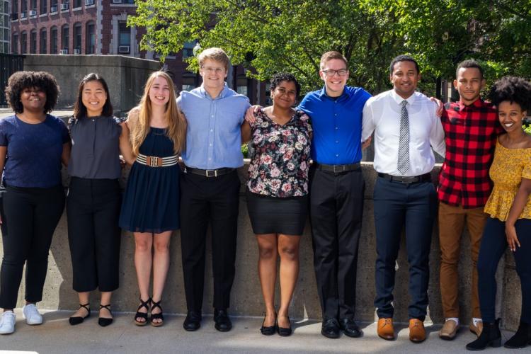 Trevor Beardsley stands fourth from the right in a row of the students in the summer research program.