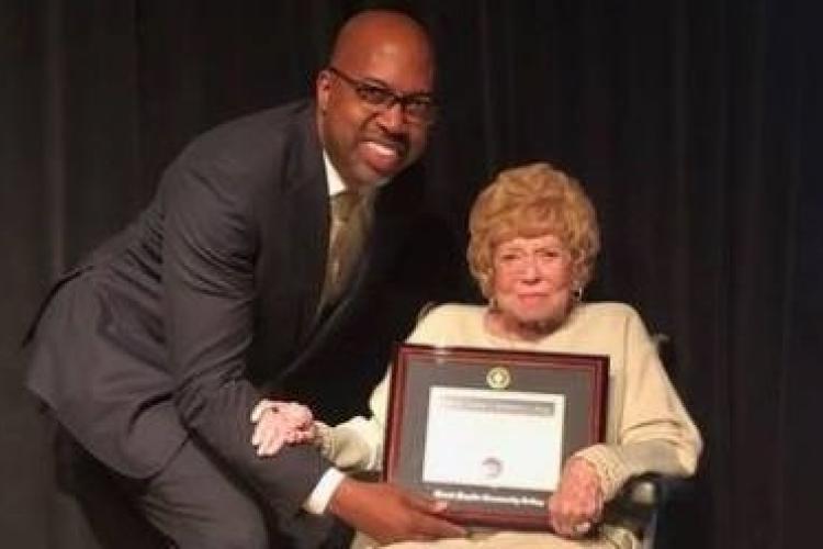 GRCC President Pink presenting Joyce Wisner an honorary degree.