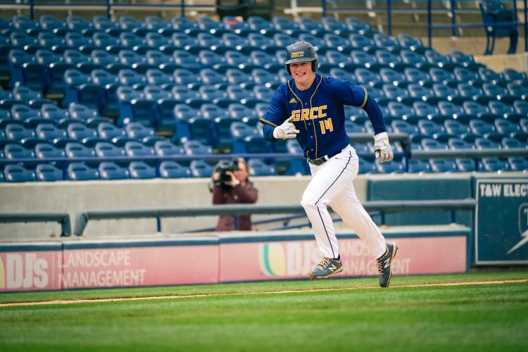 Ryan Dykstra scoring from third.