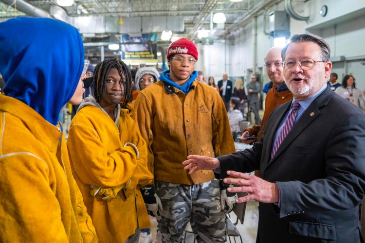 Sen. Gary Peters meeting with GRCC students. 