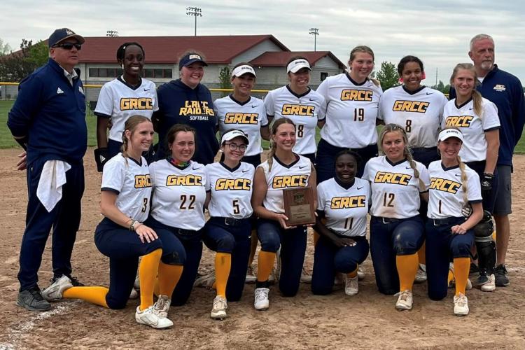 GRCC softball team posing after its Saturday game.