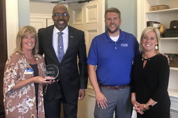 United Way Vice President Kim Ritz and account executive Scott Sorenson presented President Bill Pink and Misty McClure Anderson, executive deputy to the president and board liaison, with the 2020 United Way Top Campaign Award.