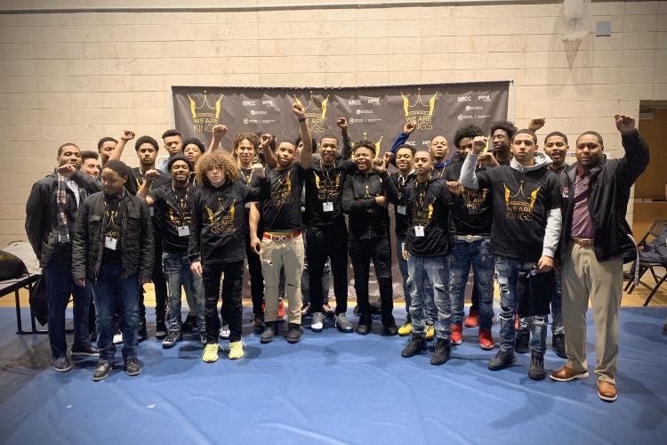 Students attending a prior year's conference in matching t-shirts.