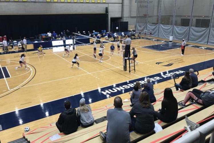 Fans sitting in the Ford Fieldhouse bleachers for first time this season.