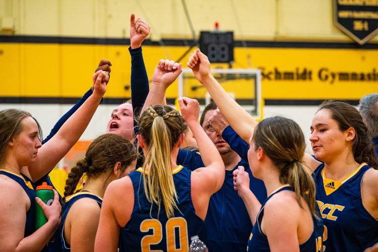 Women basketball players supporting each other after the game. 